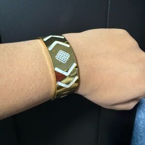 Gold and Silver Wearable Tech Bracelet